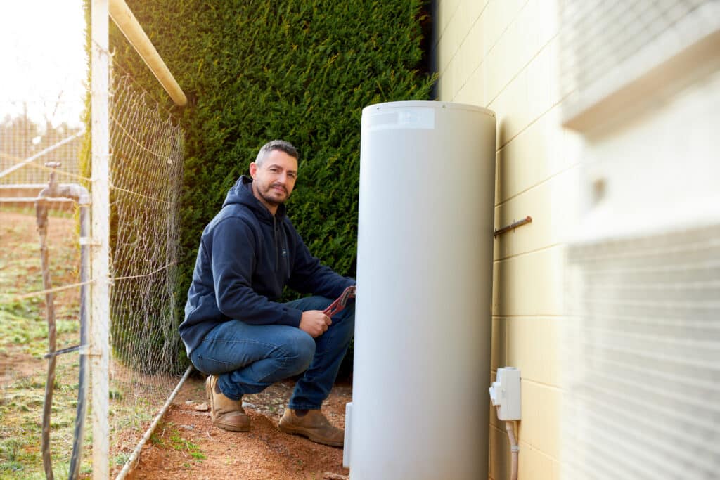 Canberra plumber installing a hot water system solution