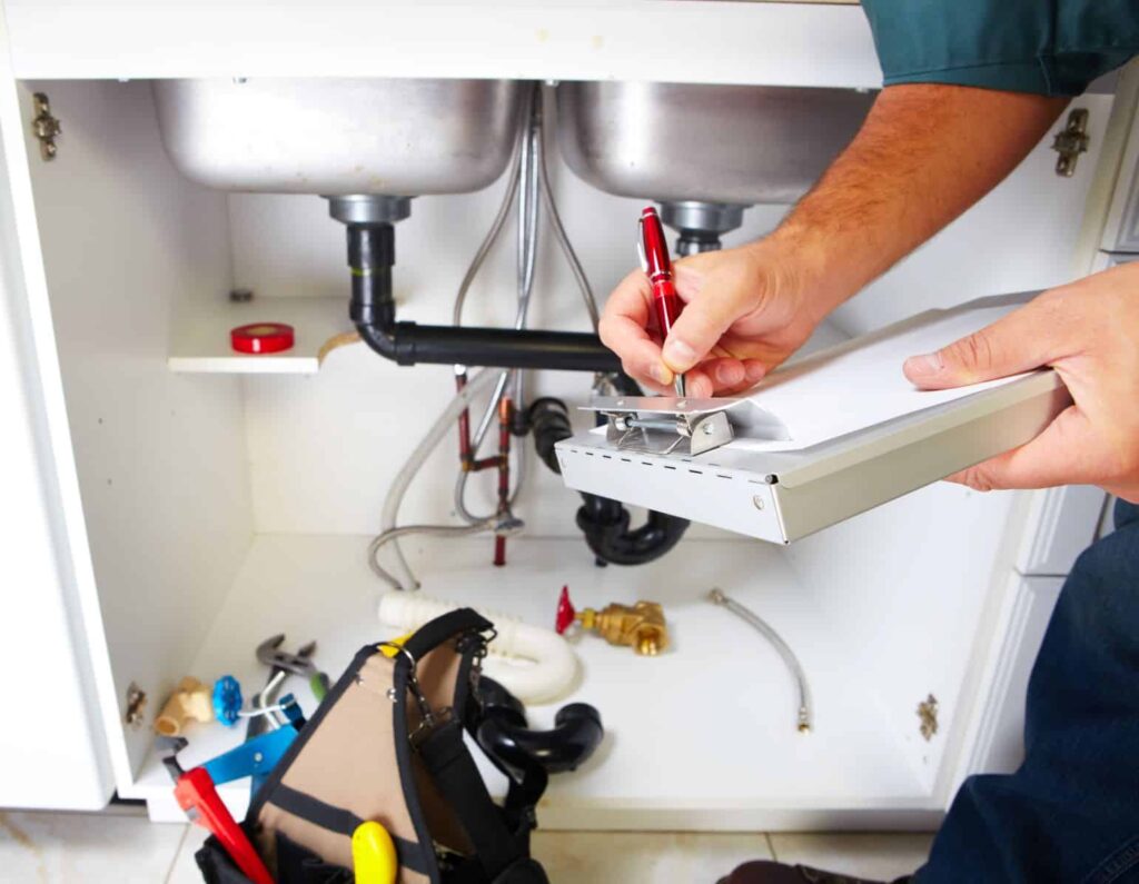 plumber with clipboard